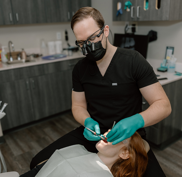 Dr. Schuiteman treating a dental patient