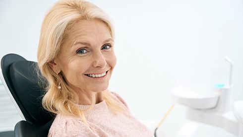 Woman smiling at the dentist