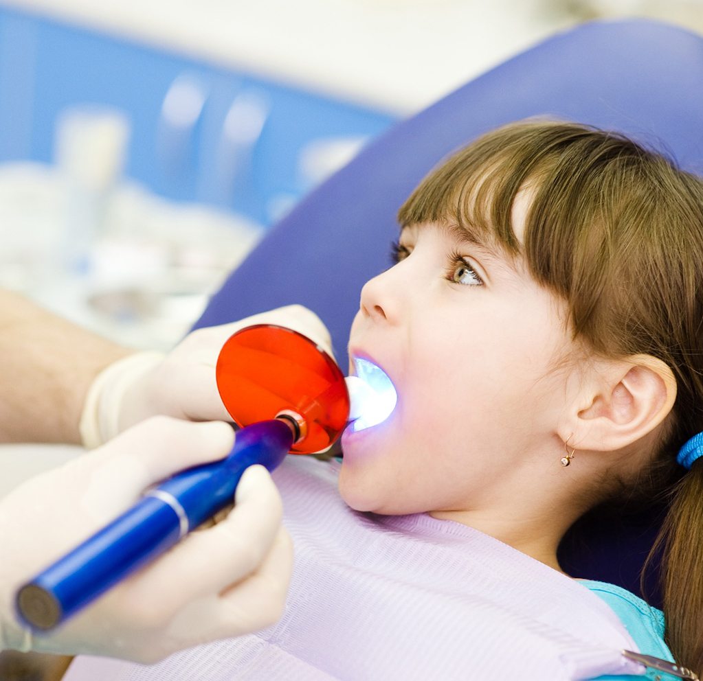 a child receiving a dental filling