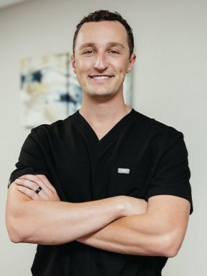 Headshot of Dr. Alex Woods