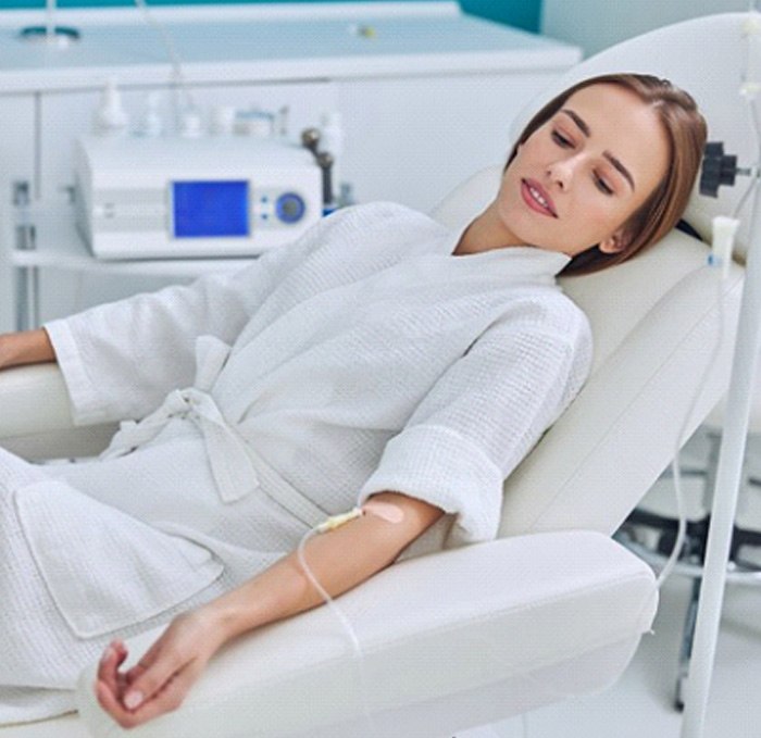 Patient in Brandon relaxing comfortably in dental chair during IV sedation